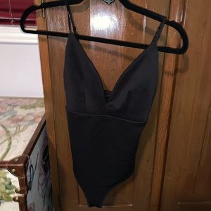 Revamped black body suit